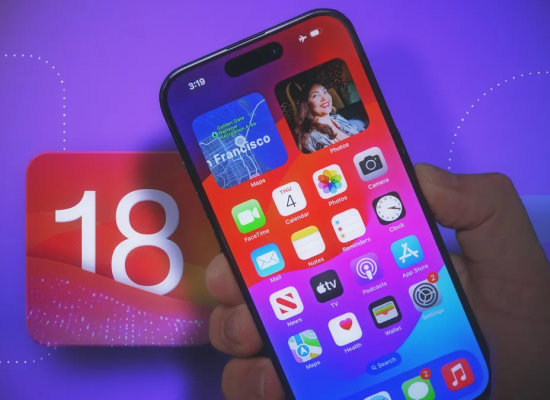 iPhone in front of iOS 18 logo.